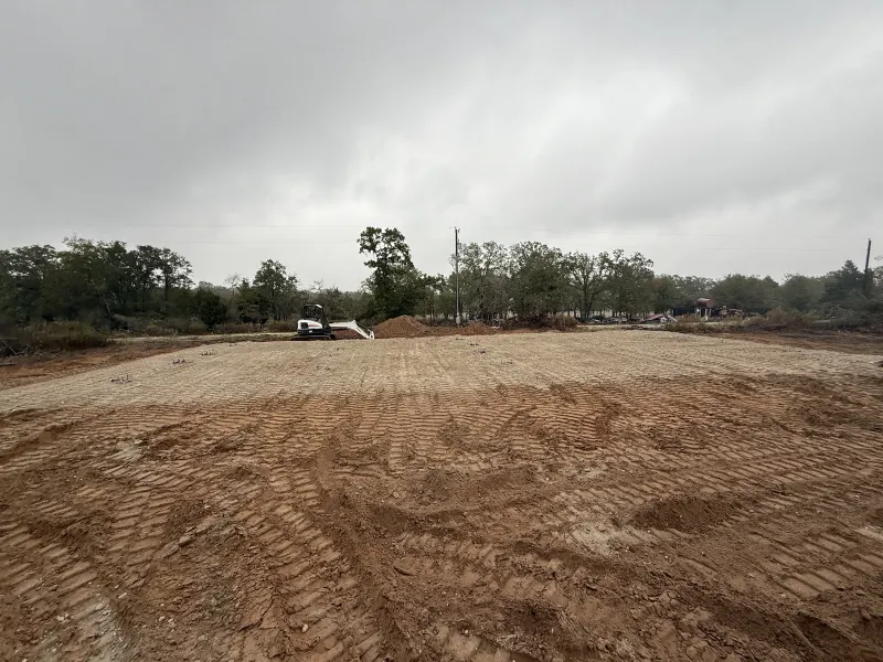 Pad cut, graded, and compacted where the brush stood